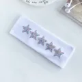 Fascia in maglia a costine bianca con stelle di strass colorate accessorio per capelli - Bianco