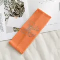 Oranje strass strik gebreide haarband, elastische geribbelde haaraccessoire voor dames. - Oranje