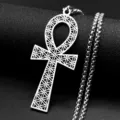 Detailed shot of retro Egyptian ankh cross pendant necklace with sacred geometry flower pattern in silver. - Silver