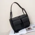 Stylish genuine leather shoulder bag for women, large capacity tote with front pockets design. - Black