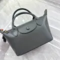 Bolso de mano de dumpling de cuero genuino, bolso cruzado retro versátil para mujer. - Gris Premium