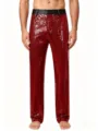Close-up detail of shiny red sequin trousers for men, featuring a sleek black waistband. - M / Red