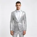 Close-up detail of a sparkling silver sequin men's suit jacket with a stylish white lapel. - Silver with White Collar