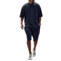 Detail view highlighting the loose fit, raw edges, and soft fabric of the dark casual outfit. - Navy Blue