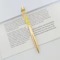 Detail of gold metal ballpoint pen featuring yellow dried flowers in clear oil barrel - 1.0mm Bullet Tip / Gold Plating