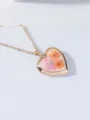Elegant handmade heart locket necklace with dried flowers in gold-plated brass finish. - Orange Dried Flower (F)