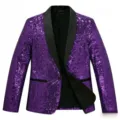 Close up view of purple sequin fabric texture and black shawl lapel on party blazer. - Purple