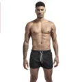 Pantaloncini da mare estivi neri da uomo tinta unita con coulisse bianca regolabile - Taglia S / Nero