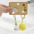 Cute duck and garlic PVC keychain pair with backing card, trendy cartoon bag pendant charm. - Garlic Duck / Pearl Bag Packaging
