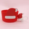 Red silicone cup sleeve with cute Christmas hat design, protective boot for thermal tumblers. - Christmas Hat Set
