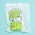 Cute magnetic couple frog keychains made of soft PVC, ideal matching gift for partners. - Frog Couple / Pearly Paper Card Packaging