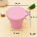 Portable foldable silicone water cup in pink with carabiner, compact travel mug for outdoor. - Pink