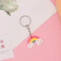 Schattige regenboog wolk PVC sleutelhanger, kleurrijke tasbedel en autosleutelhanger accessoire. - 5,5*3,5*0,3 cm / Sleutelhangerstijl - Regenboog