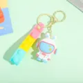 Cute cartoon astronaut rabbit keychain, PVC 3D doll bag charm and pop-it strap toy ring. - Bubble Rope - Blue Space Bunny