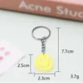 Gele smiley PVC sleutelhanger met metalen ring en ketting, schattig accessoire 7.7cm - 5,5*3,5*0,3 cm / Sleutelhangerstijl - Geel smileygezicht