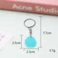 Leuke cartoon PVC zacht rubberen smiley sleutelhanger, lichtgewicht autosleutelhanger. - 5,5*3,5*0,3 cm / Sleutelhangerstijl - Blauw smileygezicht