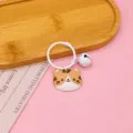 Leuke cartoon kat PVC sleutelhanger met witte bel, schattige tasbedel en accessoire. - Stijl met bellen / Kat