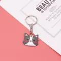 Schattige PVC cartoon kattenkop sleutelhanger met metalen ring en leuke tasbedel als cadeautje. - Sleutelring Stijl / Hond