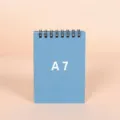 Minimalist blue A7 spiral notebook with 78x117mm dimensions, ideal for daily notes - A7 / Light Blue (Lined)