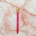 Elegant pink ballpoint pen with a large crystal diamond topper on marble background - 1.0mm Bullet Tip / Burgundy