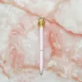 Elegant pink ballpoint pen with a large crystal diamond topper on marble background - 1.0mm Bullet Tip / Light Pink