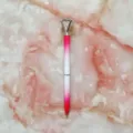 Elegant pink gradient ballpoint pen topped with a large sparkling crystal diamond - 1.0mm Bullet Tip / White To Red Gradient