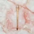 Rose gold ballpoint pen featuring a large crystal diamond top and white polka dots pattern - 1.0mm Bullet Tip / Rose Gold with White Polka Dots