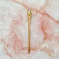 Rose gold diamond ballpoint pen with white polka dots on pink marble background. - 1.0mm Bullet Tip / Gold Barrel with White Polka Dots