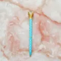 Elegant light blue polka dot ballpoint pen featuring a large crystal diamond top decoration - 1.0mm Bullet Tip / Blue Barrel with White Polka Dots