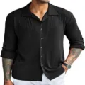 Close-up of black ribbed long-sleeve shirt, lapel collar and texture button design. - S / Black