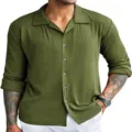 Close-up detail of the men's green ribbed long sleeve button-down shirt showing collar and texture. - S / Army Green
