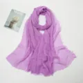 Detail shot of light purple crinkled cotton linen scarf with frayed edges texture showcase. - 14# Light Purple