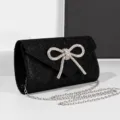 Black glitter evening bag with rhinestone bow, elegant mini clutch and shoulder chain. - Black