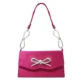 Fuchsia pink suede evening bag featuring sparkling rhinestone bow accent for women, elegant party style. - Rose Red