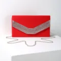 Red velvet evening clutch bag with sparkling rhinestone V-shaped design and silver chain strap. - 24*6*13cm / Red