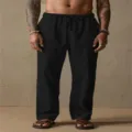 Vista detallada de pantalones casuales de lino y algodon para hombre con cordon ajustable. - S / Negro