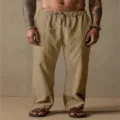 Men's casual khaki linen trousers detail view, featuring comfortable drawstring waist. - Beige