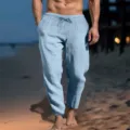 Men's casual linen pants detail showing comfortable elastic drawstring waist and pocket design. - S / Bottoms / Light Blue