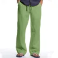 Men casual linen trousers detail showing breathable fabric, adjustable drawstring waist style. - S / Green