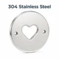 Close-up view of a 304 stainless steel round plate featuring a heart-shaped cutout design - Silver