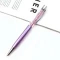 Elegant purple metal ballpoint pen featuring sparkling pink crystals in a clear barrel - Light Purple