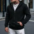 Men's black textured zip-up hooded sweatshirt, casual outerwear with front pocket and drawstring. - S / Black