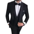 Detailed view of the elegant men slim fit three piece black suit with white shirt and bow tie. - Black