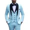 Close-up detail of light blue men's three-piece suit with black shawl lapels and bow tie. - US Size M / Set / Light Blue