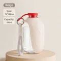 Portable 300ml dog water bottle for travel in beige with silicone trough and strap - 300ml Flip-Top Mini Water Bottle / Beige/Red