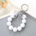 Portachiavi da polso con perle bianche stile coreano e fiocco argento per borse - Ciondolo Fiocco a Nastro & Perline Bianco (K4710)