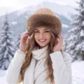 Women's warm winter knit hat with thick brown faux fur trim in a snowy scene - One Size / Vertical Stripe Mongolian Hat / Khaki