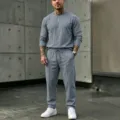 Close-up detail of the grey linen casual long-sleeve top and trousers set for men. - S / Top And Bottom / Steel Gray