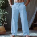 Detailed view of men casual light blue linen trousers showing soft fabric and elastic drawstring waist. - Light Blue