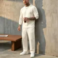 Detailed view of men's casual linen long sleeve crewneck top and matching pants set. - S / Top And Bottom / Natural